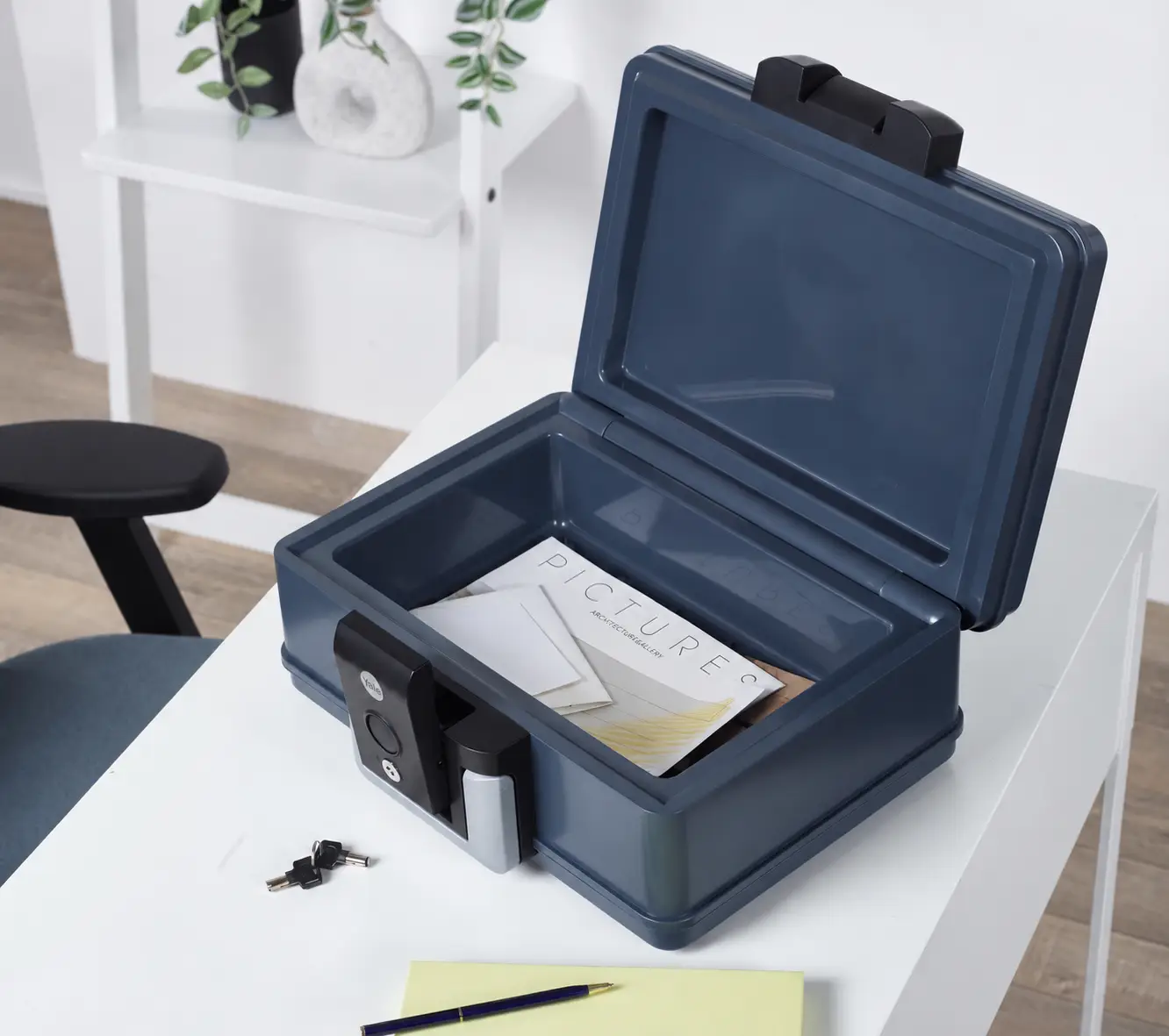 Hands sorting labelled contracts and paper folders on an office desk, without cash or valuables