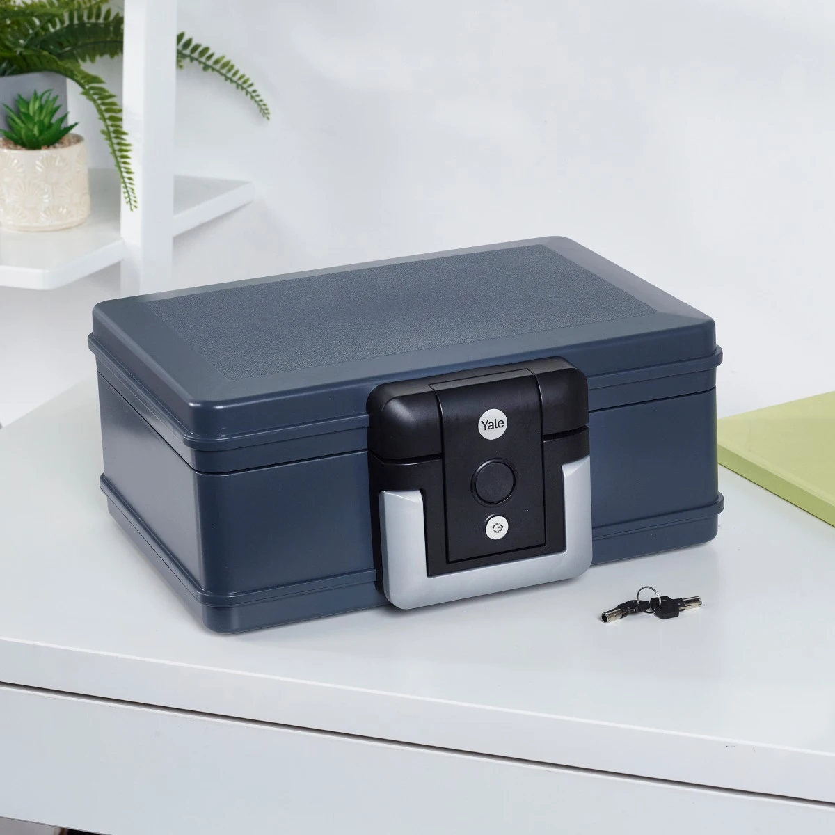 Yale Small Fire Chest YFC/154/KB1 closed on a neutral surface